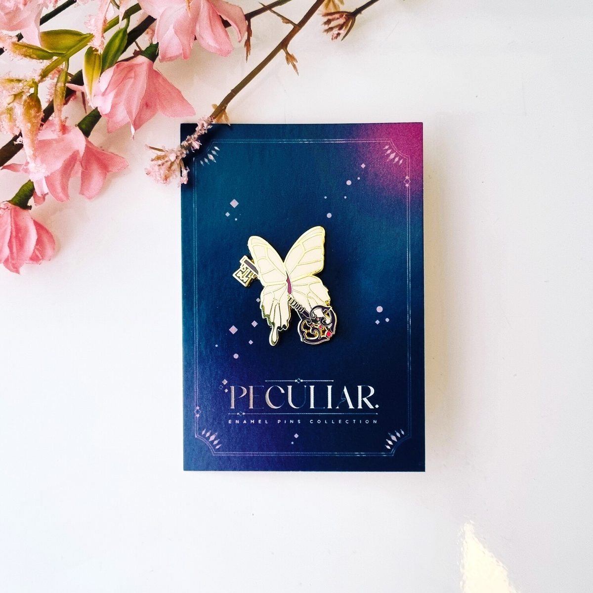 Peculiar Enamel Pin - Butterfly Key
