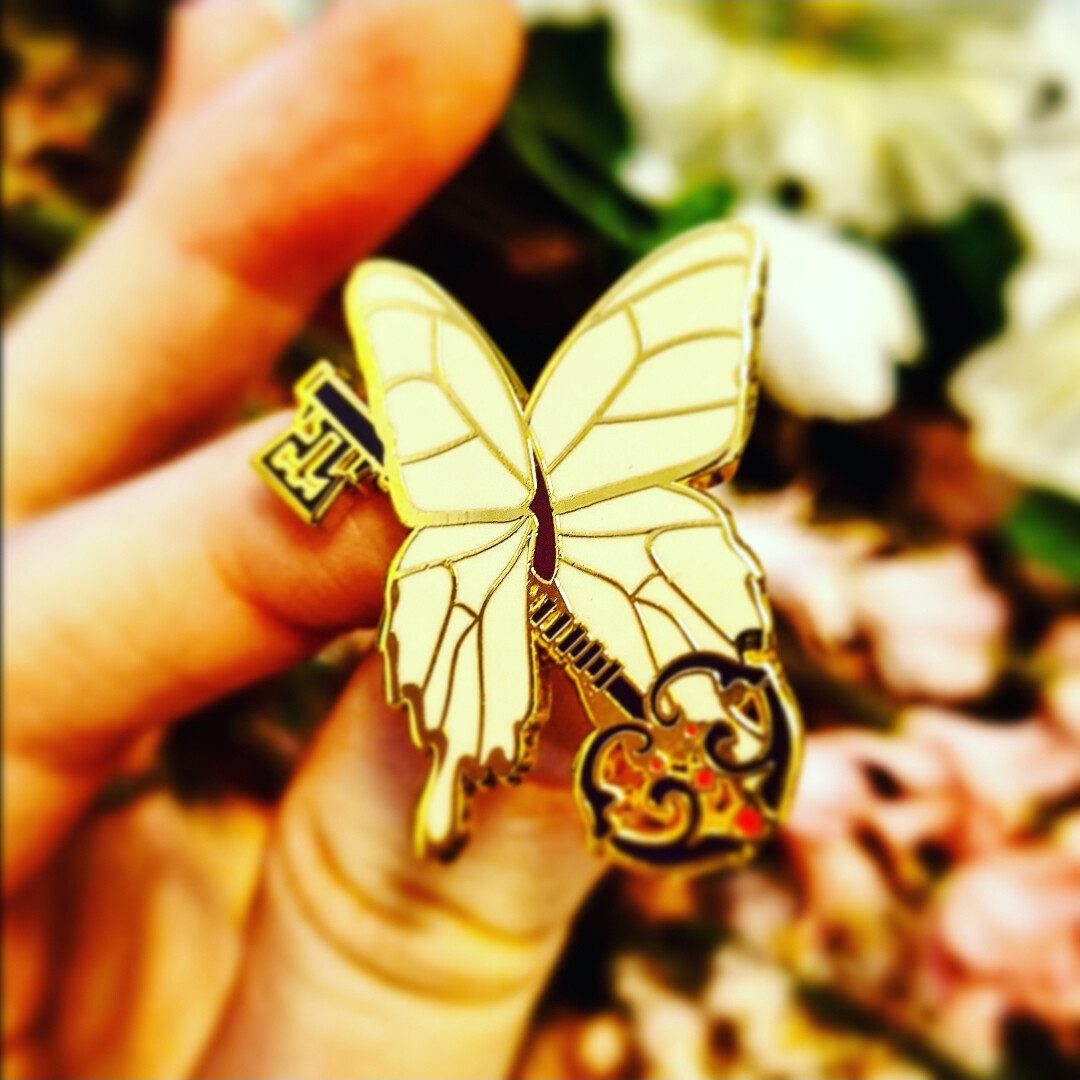 Peculiar Enamel Pin - Butterfly Key