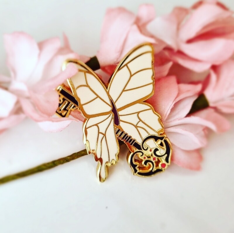 Peculiar Enamel Pin - Butterfly Key